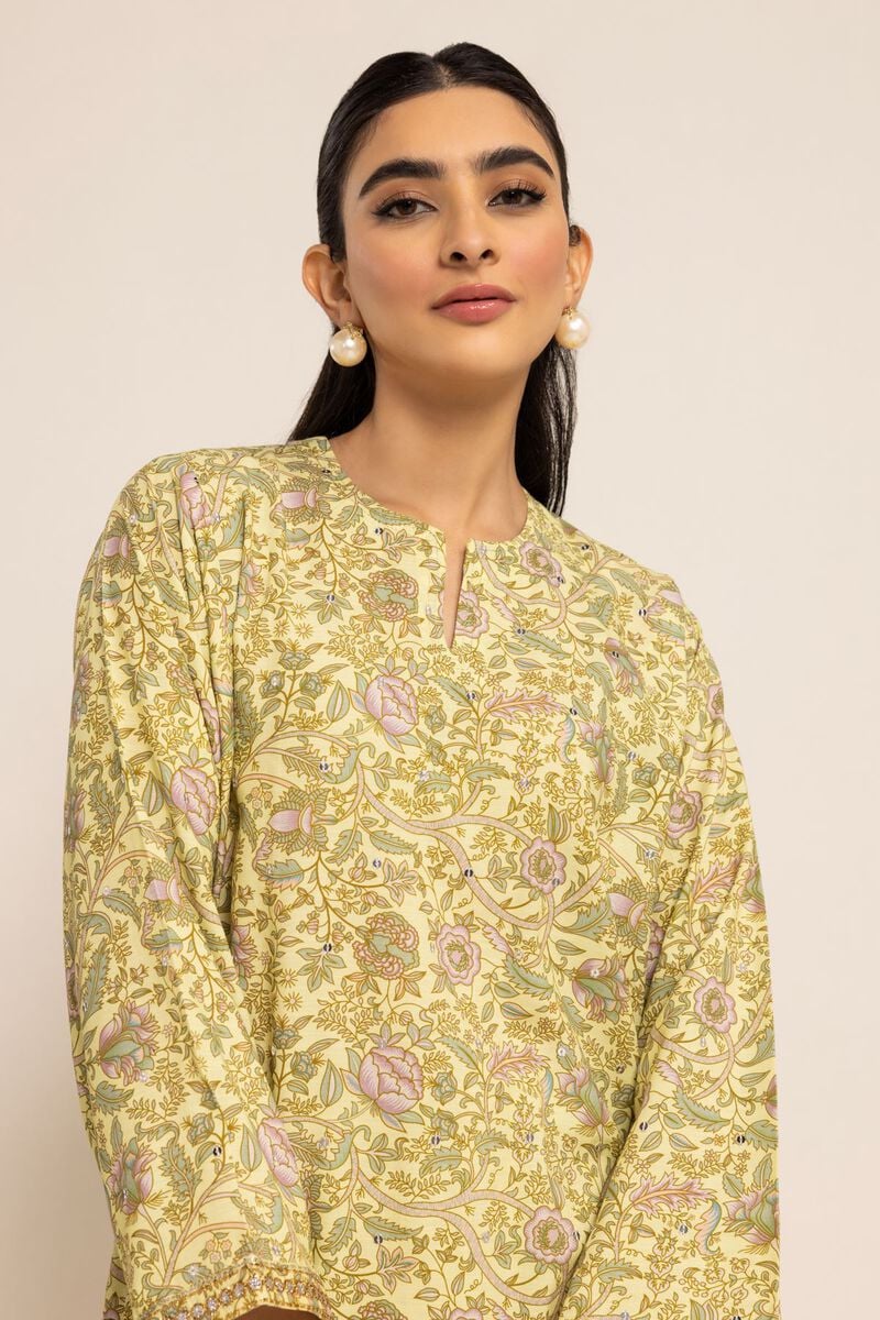 WOMEN WEARING Pakistani suits in Canada with this elegant Khaadi floral embroidered kurta, designed for casual elegance. SHOP IT!