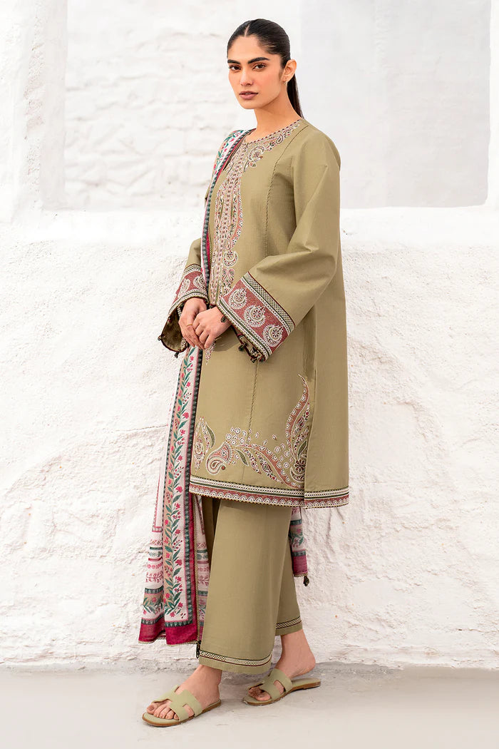 Woman standing side angle view Jazmin camel lawn suit embroidered dupatta Pakistani traditional wear Canada