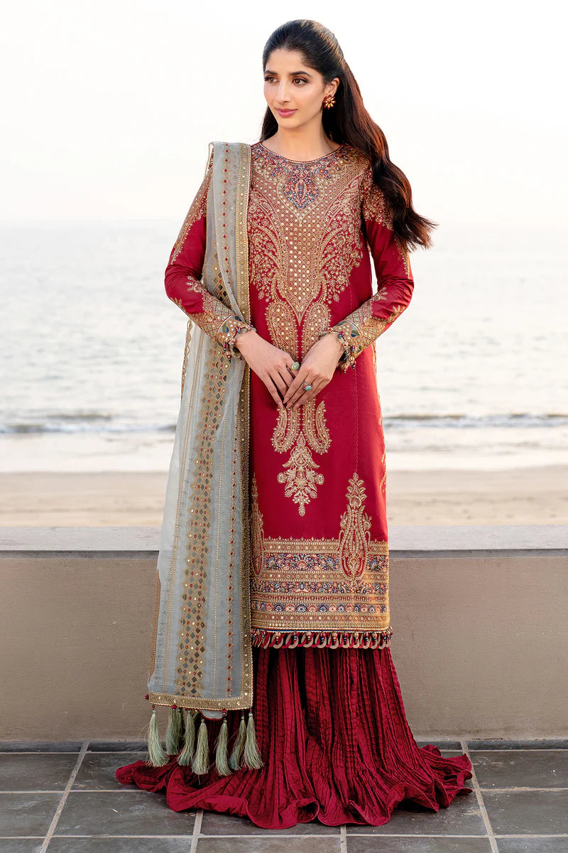 Woman wearing Jazmin front view full length crimson embroidered kurta silver mirror-work dupatta red pleated sharara Pakistani suit Canada