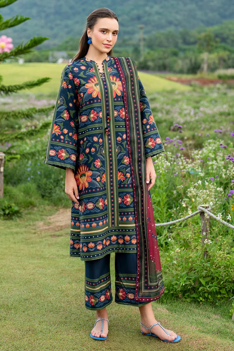 Woman standing full length front view – Jazmin JAZ-416 navy floral printed lawn Punjabi suit – Pakistani suits online Canada – Eid and Diwali