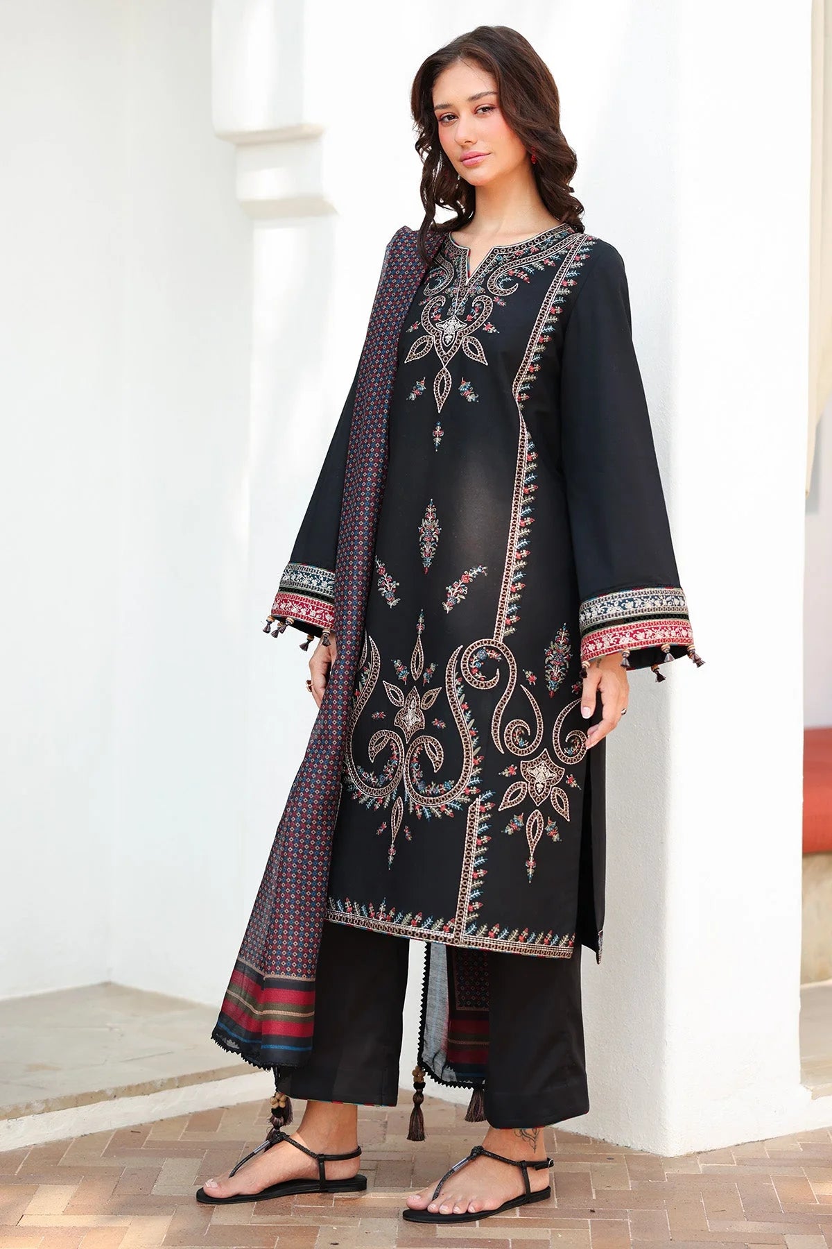 Woman standing side view full length – Jazmin JAZ-418 black embroidered lawn 3-piece Pakistani suit – Pakistani suits online Canada Eid 