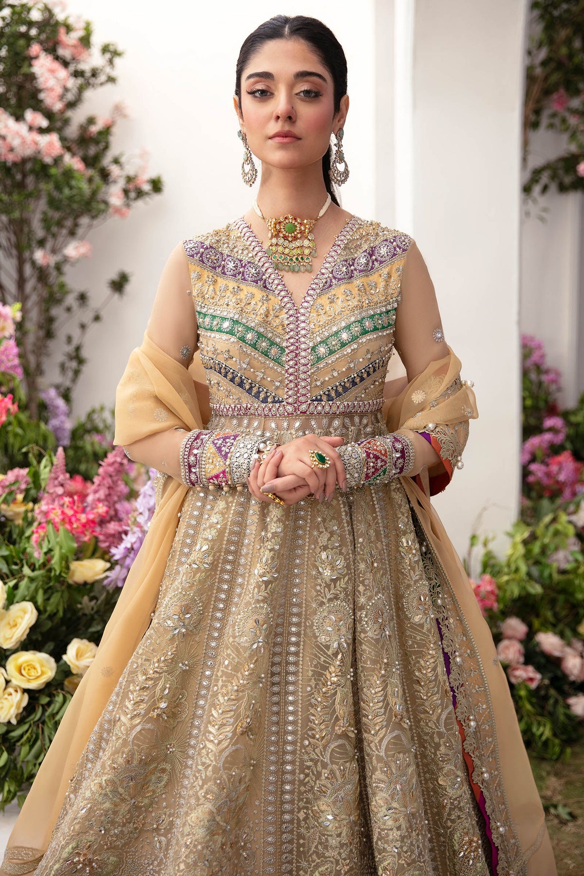Luxury beige Pakistani bridal lehenga Zaha Alysiah with full flare and detailed embroidery for weddings and festivities