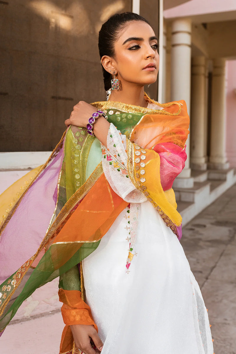 Shop Punjabi suits in Canada with this elegant white 4PC synthetic organza suit from Keyseria, featuring intricate embroidery and block prints.
