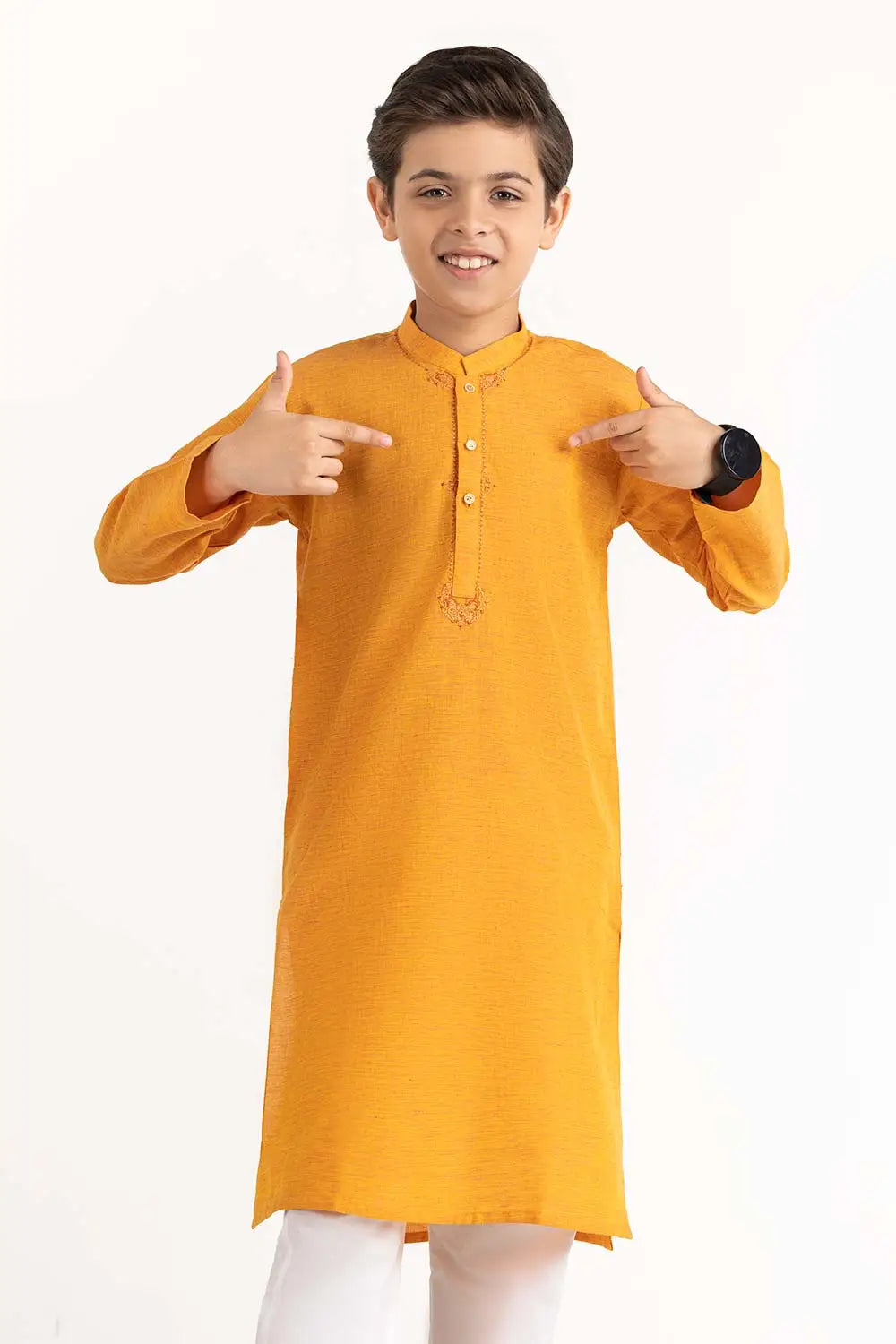 boy showing with style a marigold embroidered kurta, highlighting intricate detailing and premium cotton fabric.