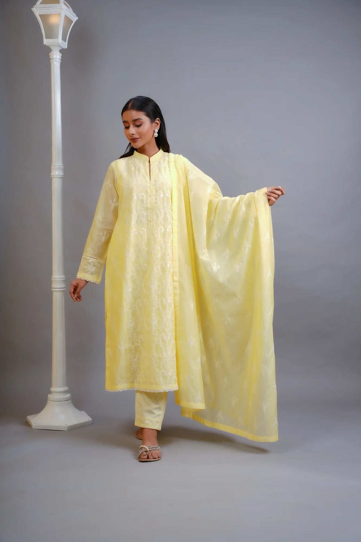 Woman standing confident pose wearing SHEEP yellow cotton net Pakistani suit online Canada 