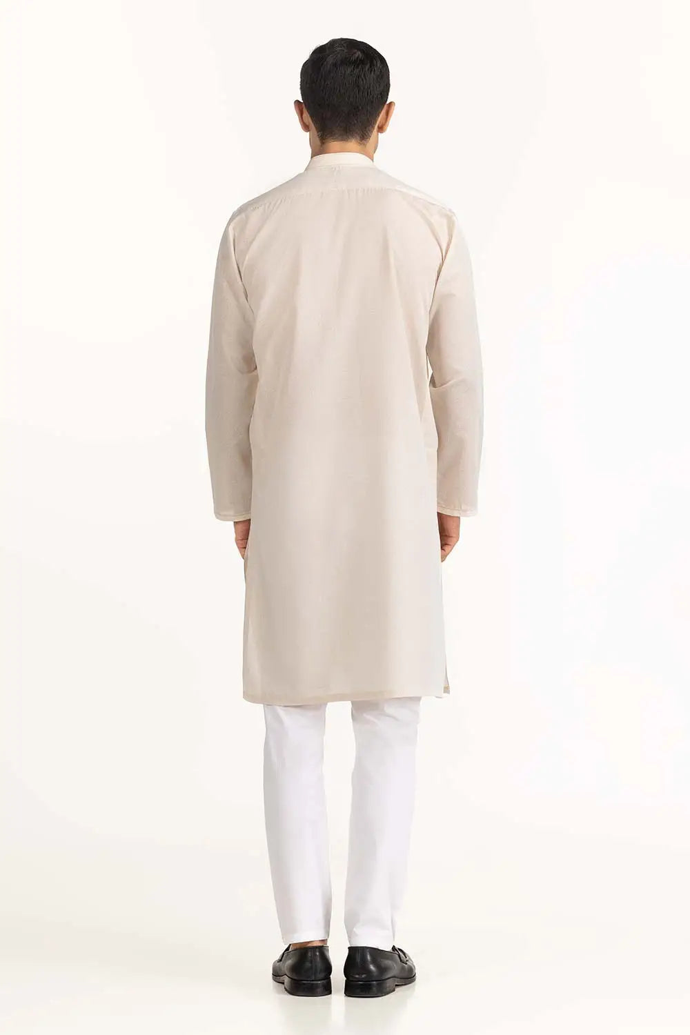 Rear view of the pastel peach kurta by GulAhmed, an elegant addition to Pakistani suits online in Canada for men.