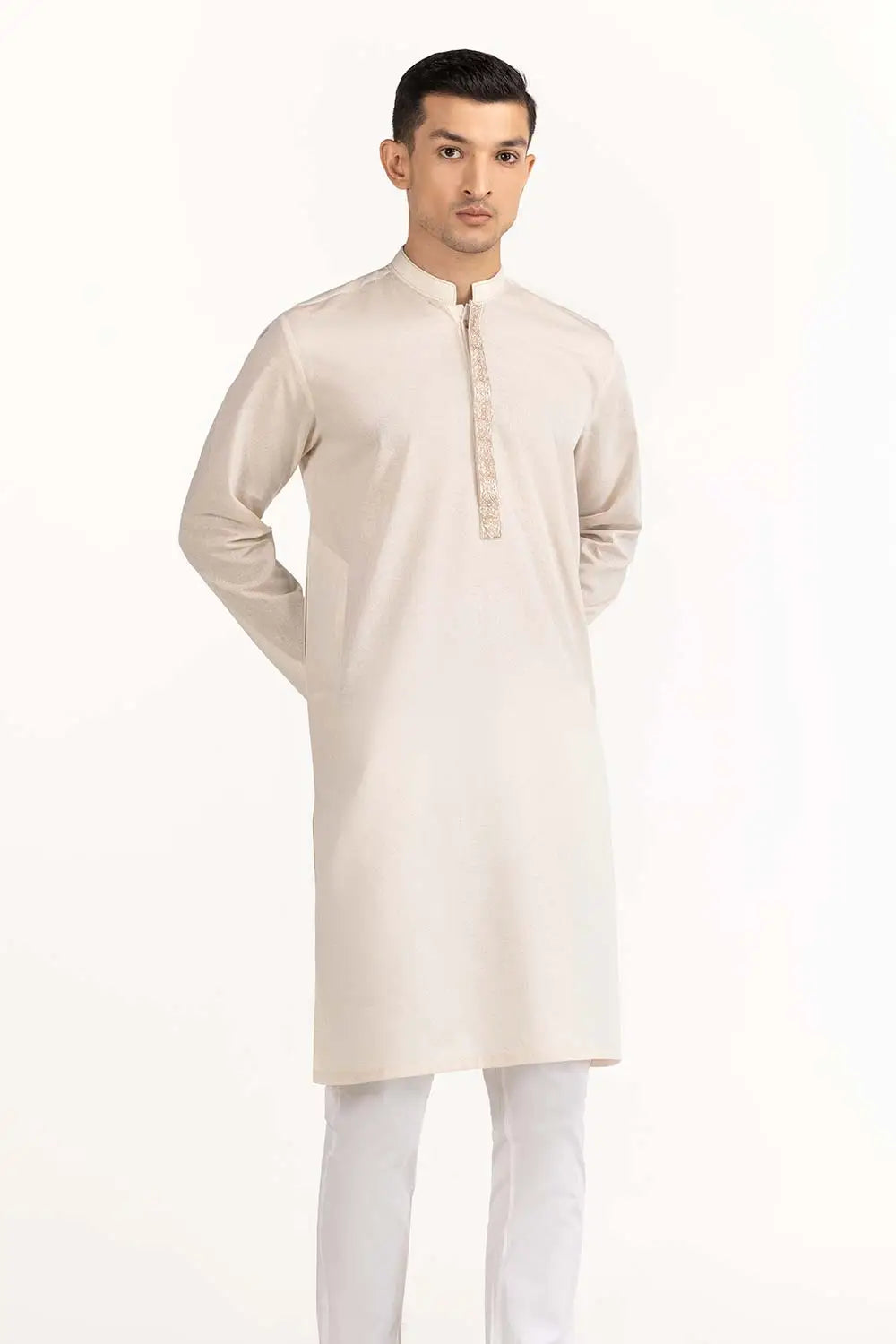 Pakistani suits in Canada – GulAhmed’s pastel peach kurta showcases timeless style and superior cotton fabric for men’s fashion.
