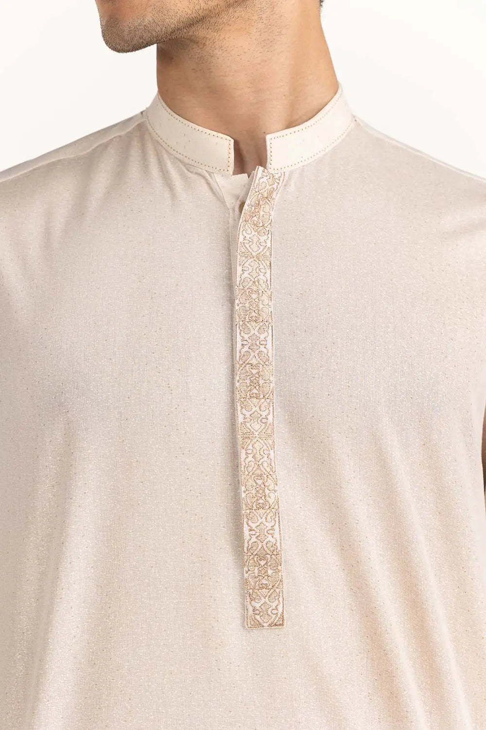 Detailed cotton texture of GulAhmed’s pastel peach kurta, highlighting its softness and premium craftsmanship – a must-have Pakistani suit for men in Canada.