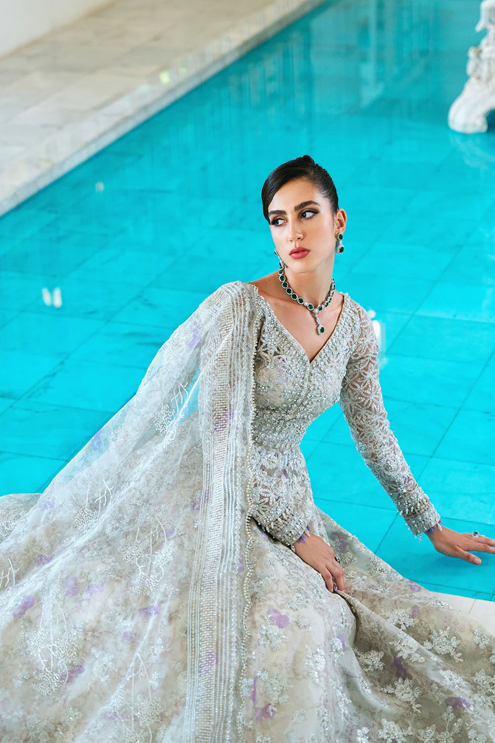 Front angled view showing Punjabi suits inspired organza shirt with embroidered details for women Medium
