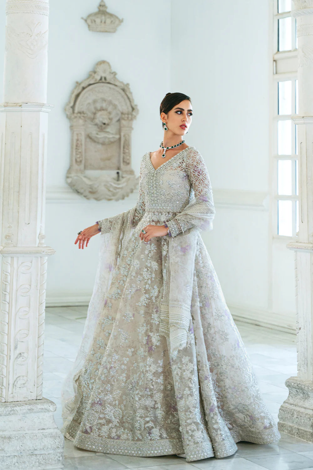 Front angled view showing Punjabi suits inspired organza shirt with embroidered details for women Medium