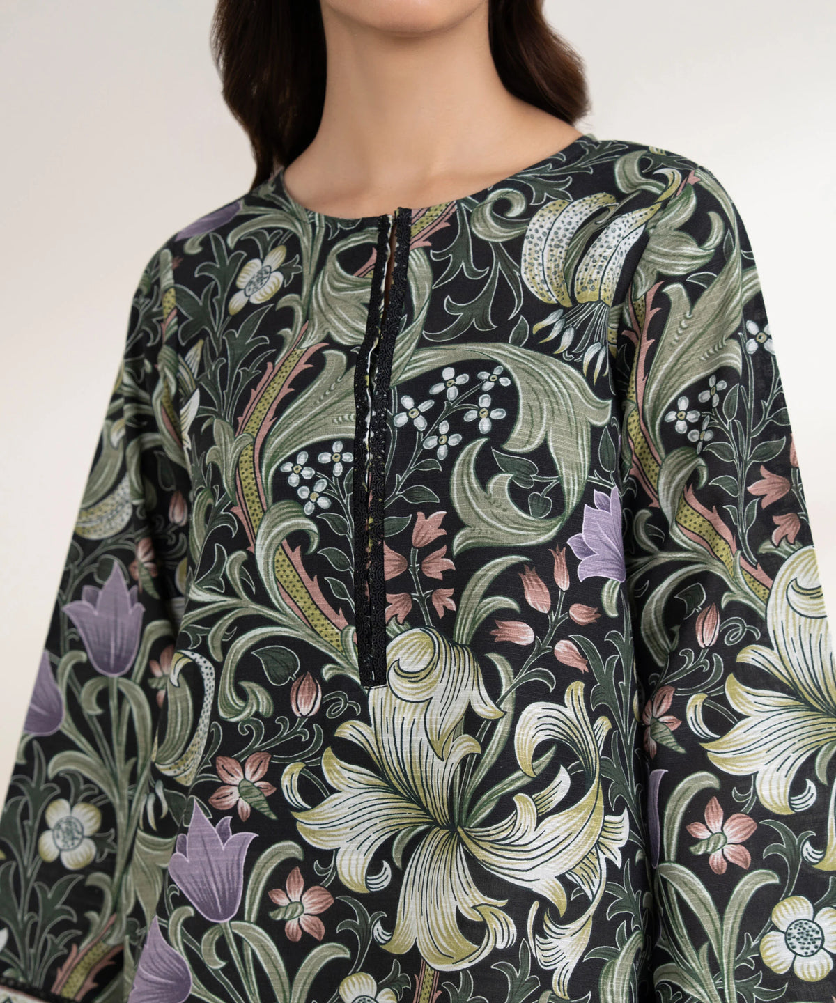 Woman close-up portrait Sapphire black cotton shirt round neckline black sequin slit trim botanical print – Pakistani suits Canada