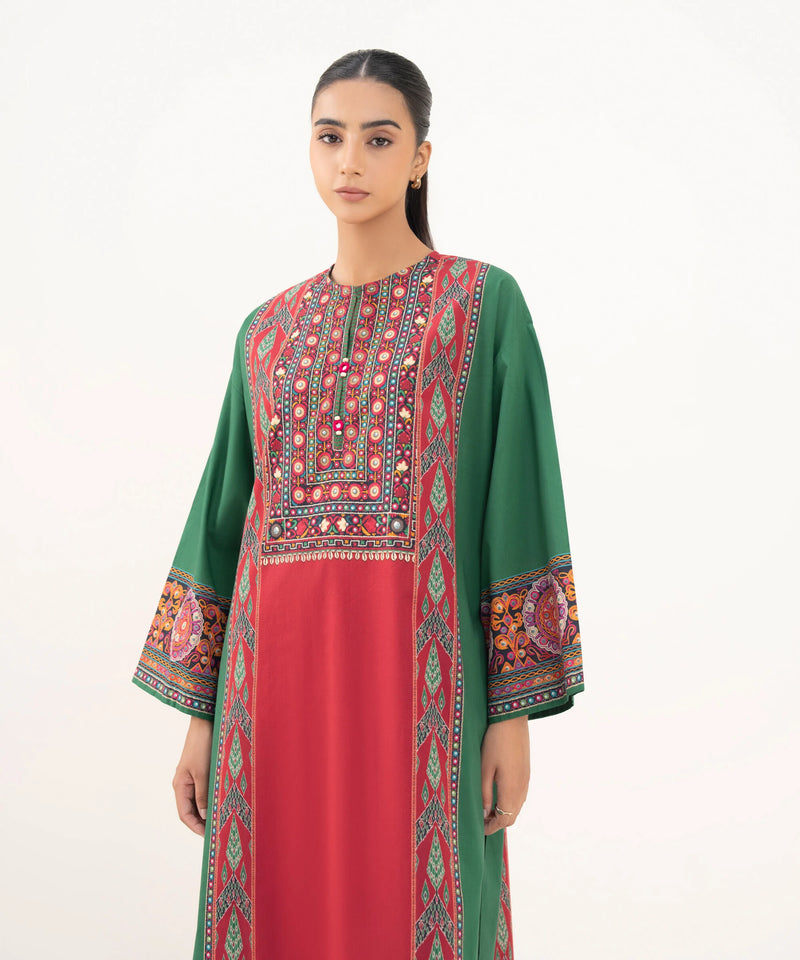 Woman close-up Sapphire green red cambric shirt Sindhi mirror work shisha embroidery cowrie fringe yoke – Pakistani suits Canada