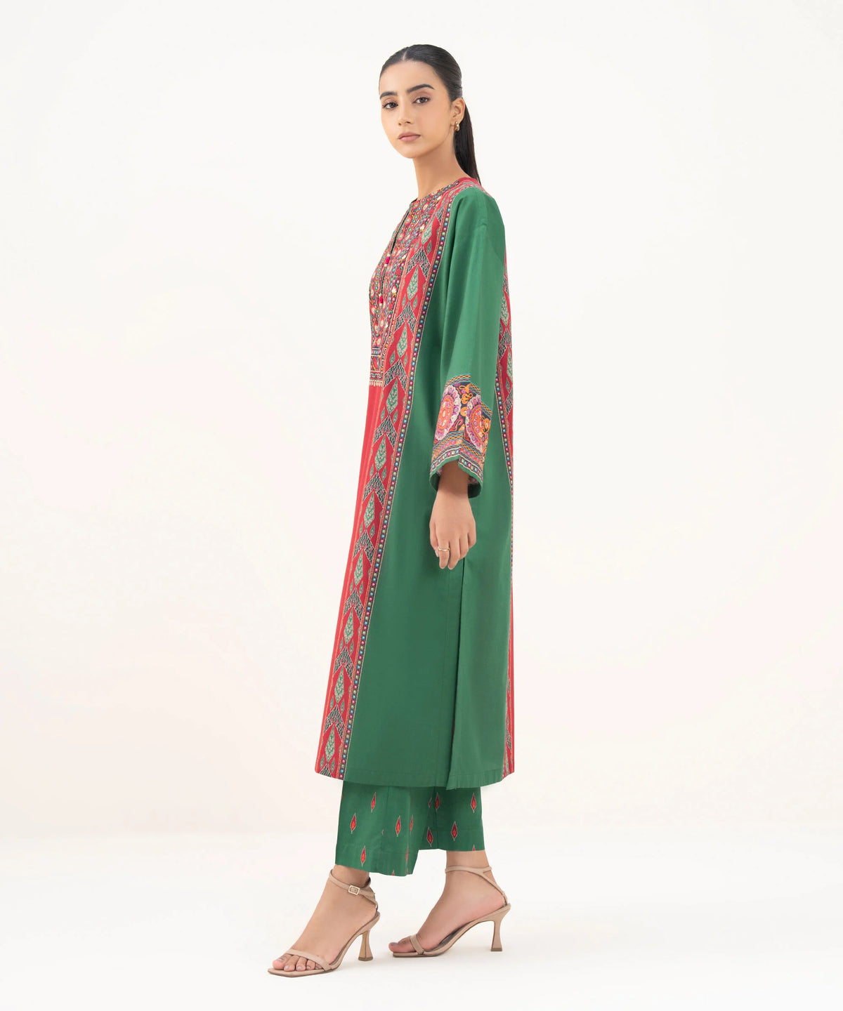 Woman portrait upper body Sapphire green red cambric shirt embroidered yoke mirror work Mughal cuff festive – Pakistani suits Canada