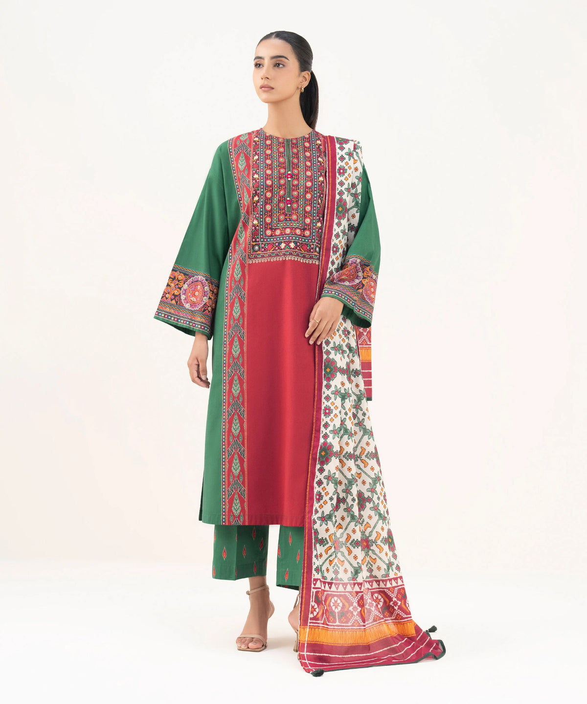 Woman angled front full length Sapphire green red embroidered suit Ajrak dupatta Eid Diwali – Pakistani suits Canada
