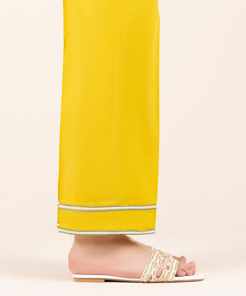Woman side close-up Sapphire mustard Pakistani suits online Canada for casual wear