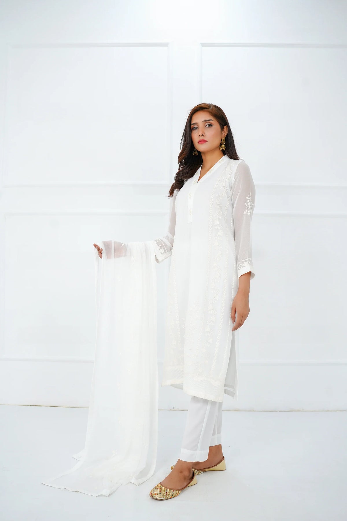 Woman full length angle view SHEEP white 3PC Pakistani suit chiffon embroidered Canada festive women