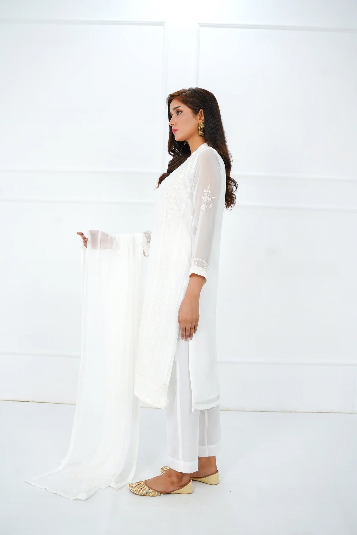 Woman showing side pose of SHEEP white 3PC Pakistani suit chiffon embroidered Canada wedding festive women