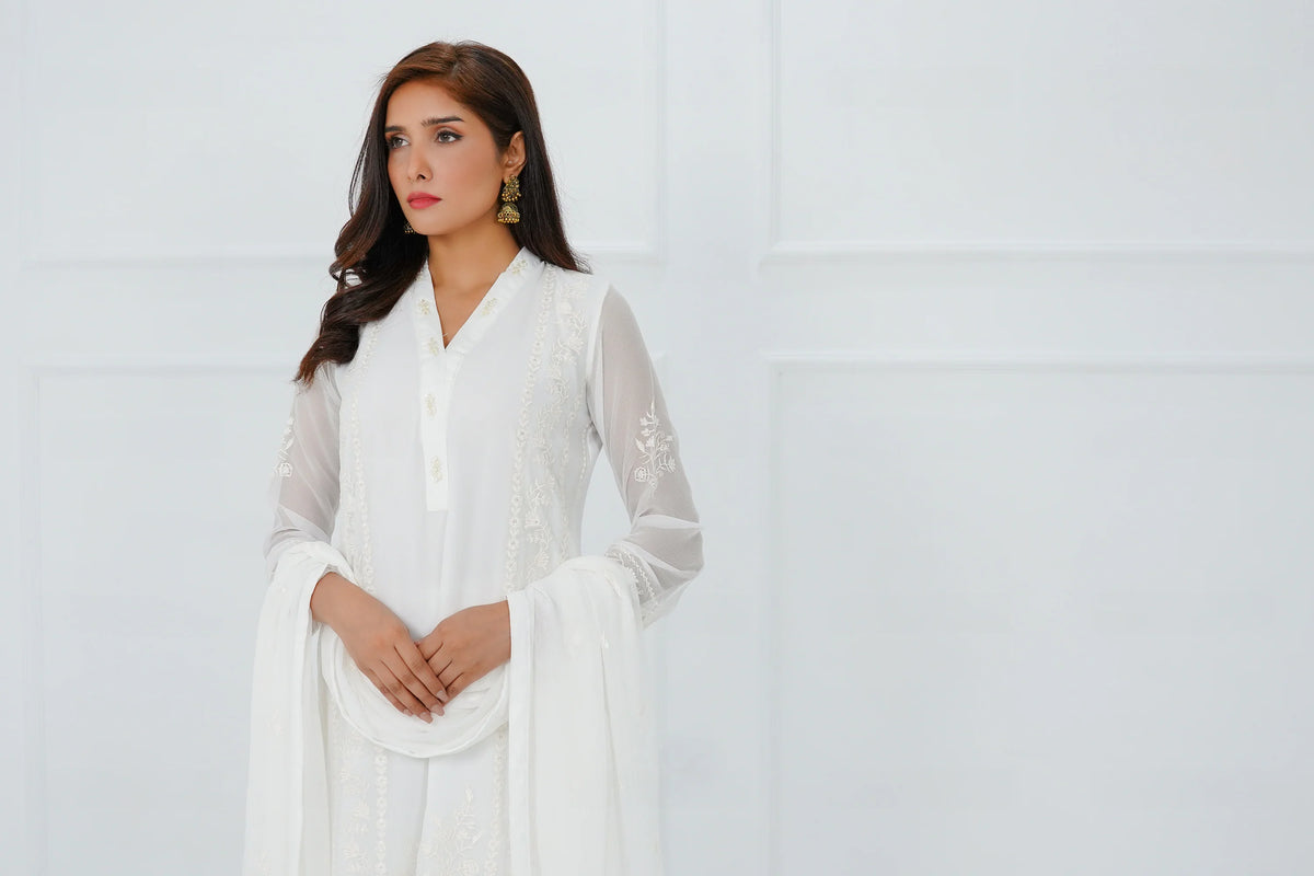 Woman portrait close-up SHEEP white chiffon embroidered Pakistani suit Canada Eid traditional women