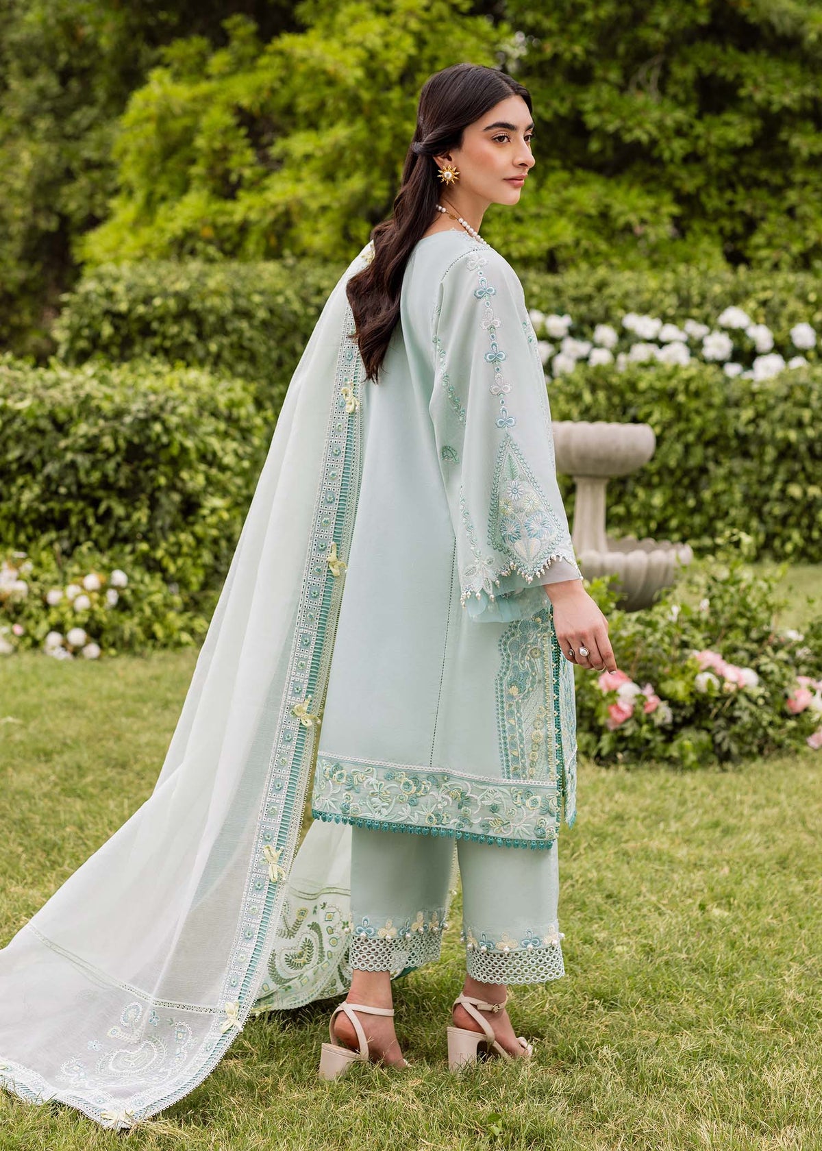 Traditional Pakistani clothing - Aqua Zaphira by Brand Sadaf Fawad Khan with embroidered lawn and khaddi net dupatta.