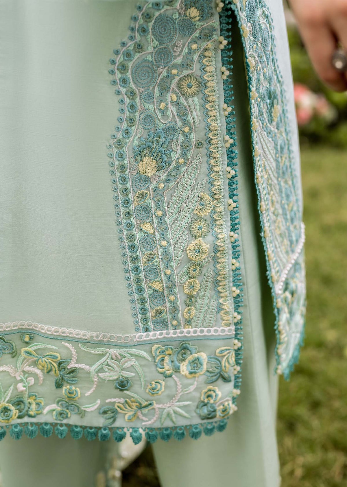 Traditional Pakistani clothing - Aqua Zaphira by Brand Sadaf Fawad Khan with embroidered lawn and khaddi net dupatta.