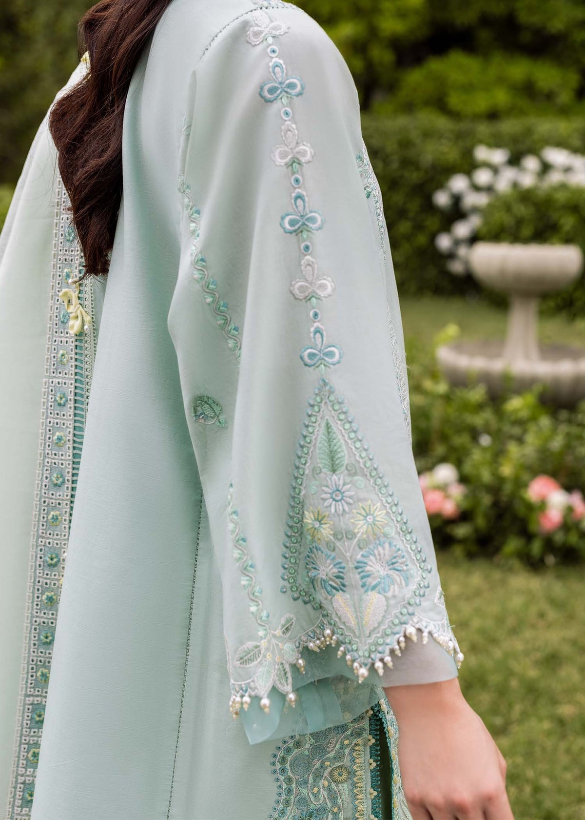 Pakistani top designers - Zaphira in Aqua by Brand Sadaf Fawad Khan with embroidered lawn and organza accents.