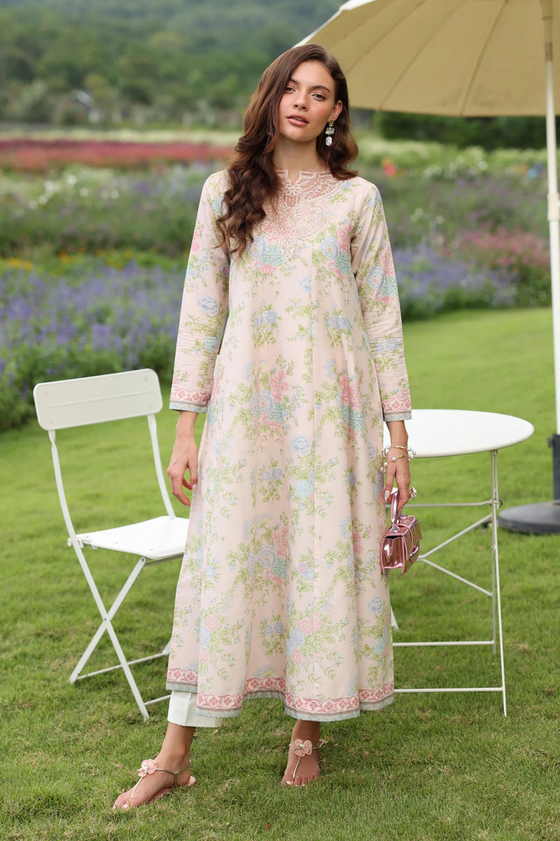 Woman standing full length back view Xenia cream floral lawn gown pink embroidered hem border Pakistani suits online Canada