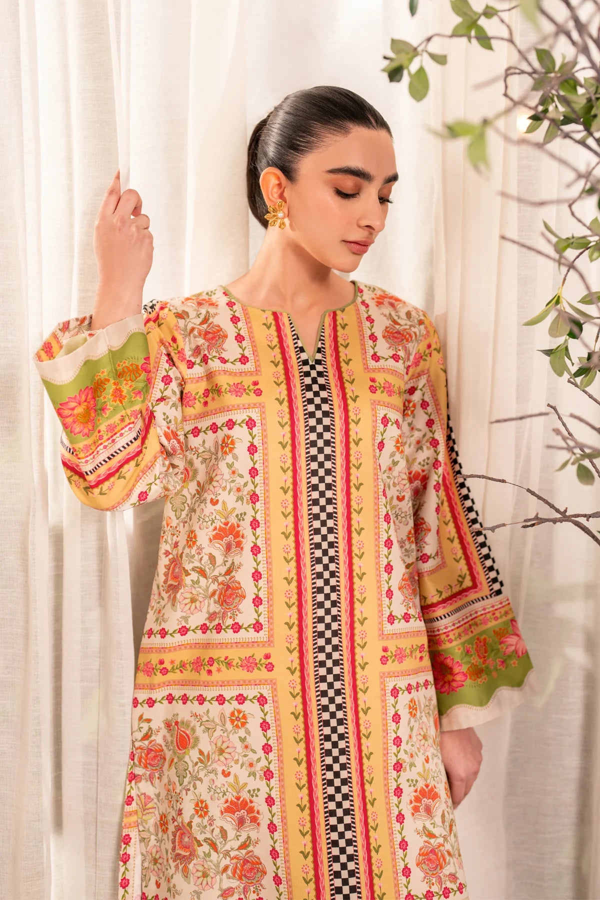Woman standing three-quarter front view Xenia Elia floral printed lawn 2-piece suit Eid festive Pakistani suits Canada