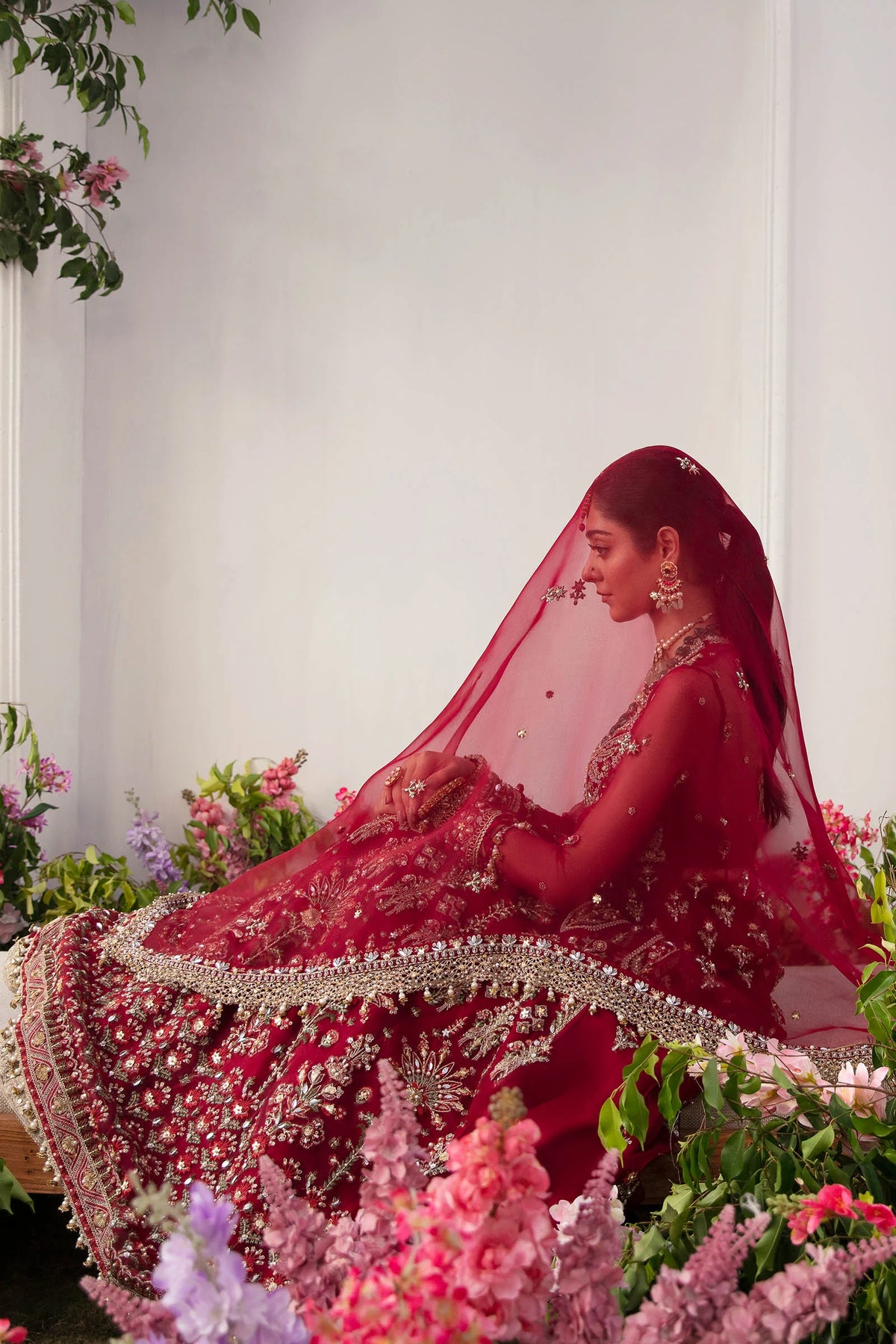 Ruby red embroidered organza maxi dress with intricate gold tilla work, belted waist, and matching dupatta - Pakistani formal wear