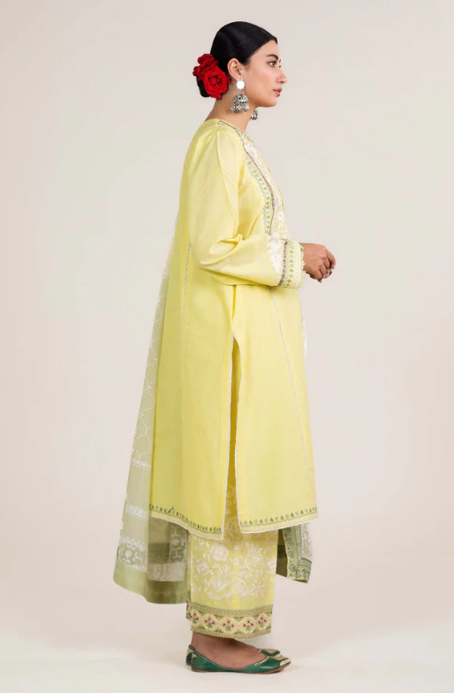 Woman wearing Zara Shahjahan lime-yellow jacquard kurta with sage pants and mint dupatta, side-view Punjabi suit Canada